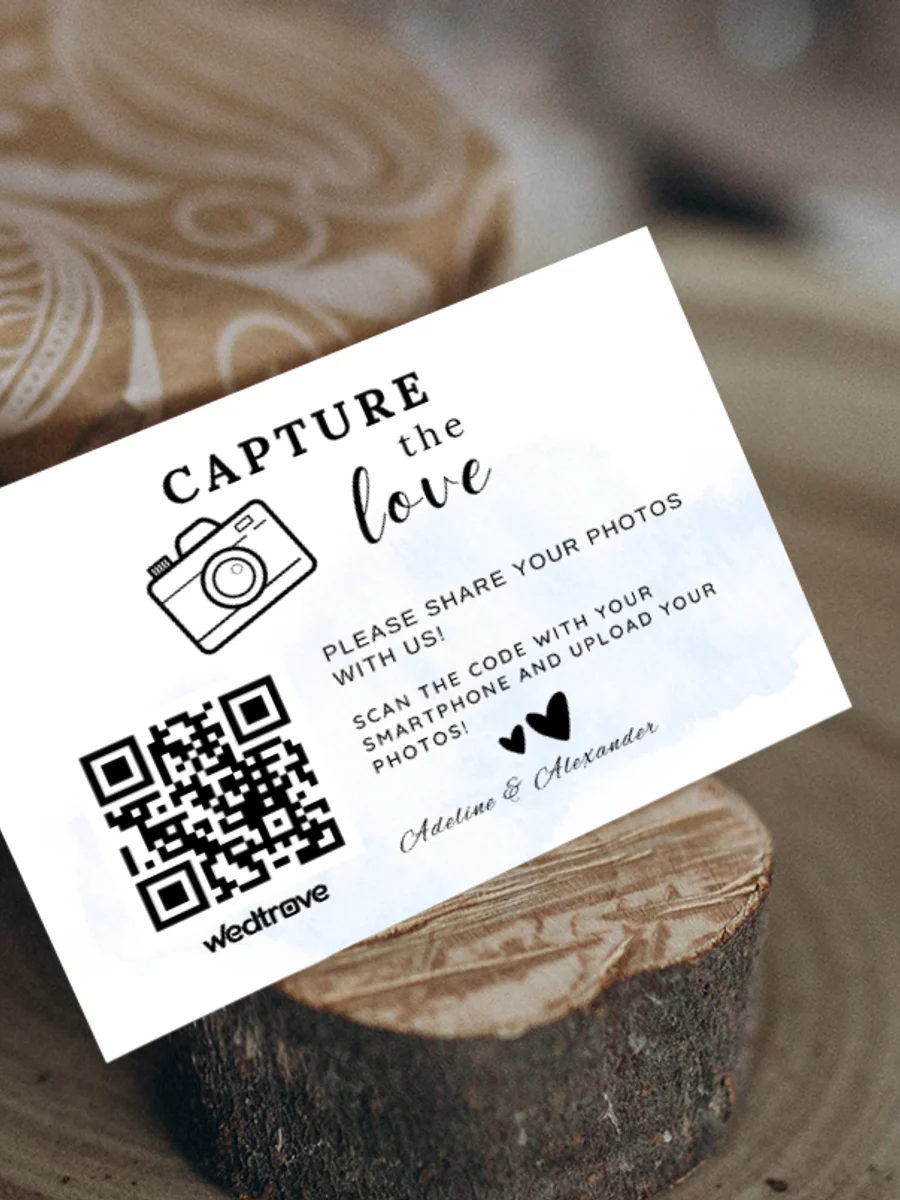 Wedding QR code program card on a reception place setting